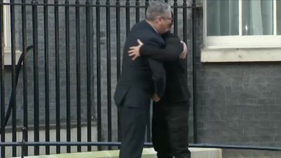 Volodymyr Zelensky greeted with warm hug from Keir Starmer outside Downing Street after Donald Trump showdown