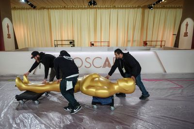 Oscar presenters Emma Stone, Andrew Garfield, Whoopi Goldberg rehearse before the show