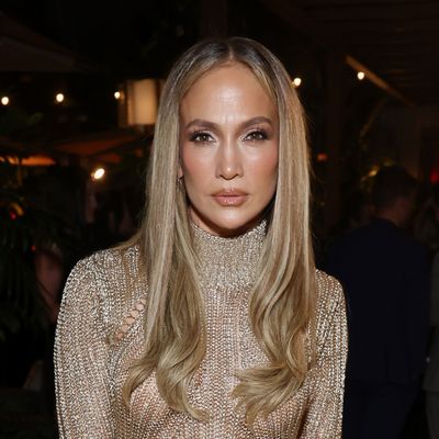 Jennifer Lopez Toasts the 2025 Oscars in a Champagne Tom Ford Gown and Luxurious Fur Coat