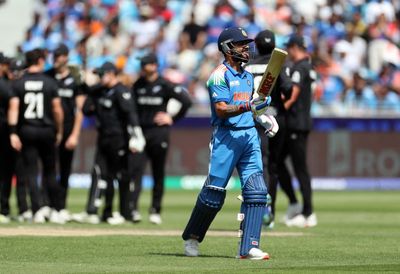 Virat Kohli falls to stunning catch as India battle New Zealand in Champions Trophy