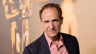 Ralph Fiennes' family's castle has over 700 years of Oxfordshire history and a moat – peek inside the stately rooms, English gardens, and storied architecture