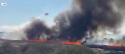 Horrifying Video Shows Plane Flying Through Billowing Smoke as Wildfires Engulf the Carolinas