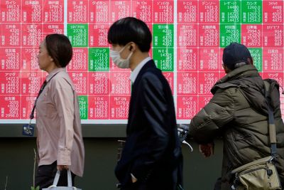 Stock market today: Asian shares advance on back of Wall St's rally and upbeat Chinese factory data