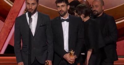 Palestinian filmmaker condemns ‘ethnic cleansing' in Oscars acceptance speech