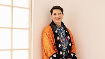 Isabella Rossellini's rustic front porch shows you exactly how to decorate with red outside – her exterior space feels expertly balanced and grounded