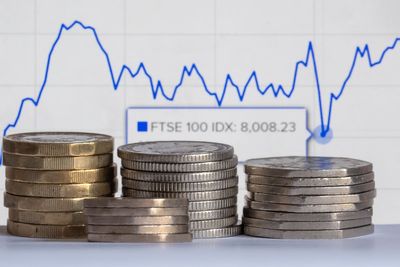 FTSE 100 hits new record as defence stocks surge