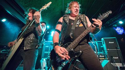 “They said, ‘We need a good singer.’ We said, ‘What’s the matter with James Hetfield?’” NWOBHM survivors Raven on giving insecure Metallica their first national tour, and pioneering the 8-string bass and bass trem