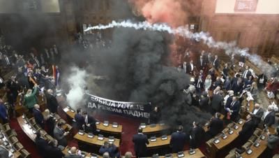 Serbian Opposition Lawmakers Protest Government With Smoke Grenades