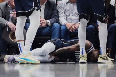 Mavs star Kyrie Irving has a torn ACL and is out for the season, AP source says