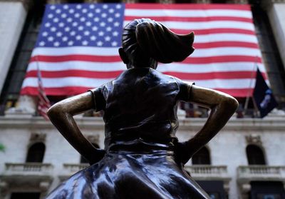 US firm that commissioned Fearless Girl statue quietly ends diversity policies