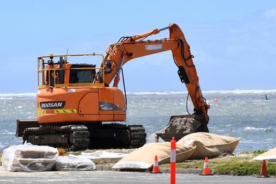 Residents prepare for the first cyclone in 51 years to hit the Australian coast near Brisbane