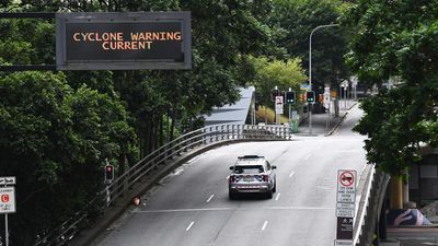 Like a hurricane: tourists brace for storm in quiet CBD