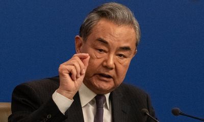 China’s foreign minister condemns US imposition of tariffs as ‘two-faced’