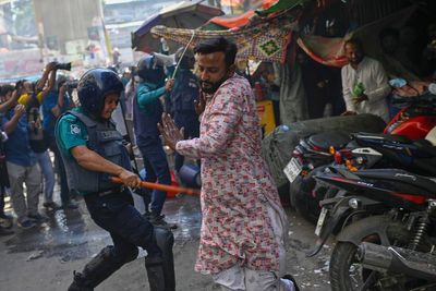 Police in Bangladesh use batons and tear gas to disperse rally by banned Islamist group