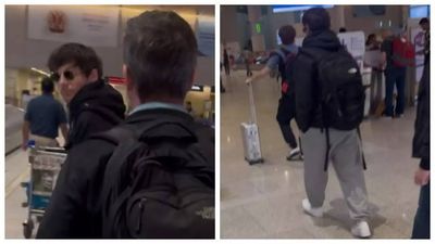 One Direction star Louis Tomlinson SPOTTED arriving at Mumbai airport; gives fans a thumbs up - WATCH
