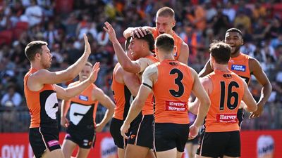 Briggs in hospital as Giants pummel Pies in AFL opener