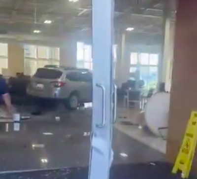 Shocking Video Shows SUV Ramming Into Car Dealership, Destroying Showroom Floor and Injuring 8