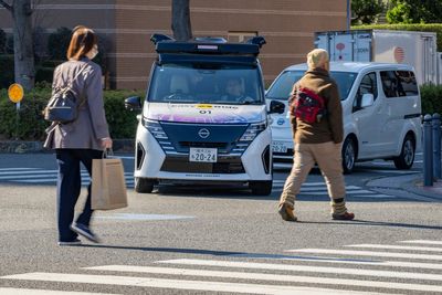 Japan's Nissan tests driverless vehicles in city streets filled with cars and people