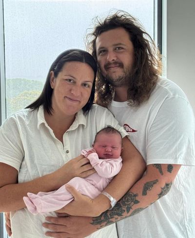 ‘Born in a cyclone’: couple welcome baby Florence as Alfred rages outside