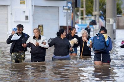 Argentina Searches For Baby, Young Sister Swept Away By Floods