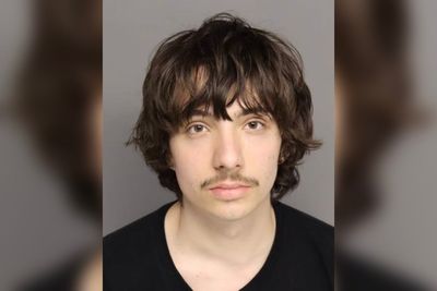 Boy arrested after teenager posts video with cache of guns threatening to shoot up Florida school