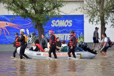 Argentina flooding: 16 killed as two girls swept away by rising waters