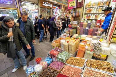 Iran’s coupons and taxes: Giving with one hand, taking with the other