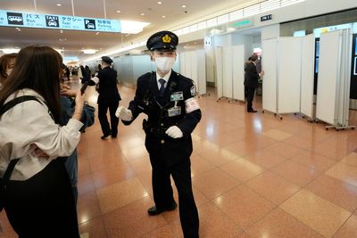 Ohtani's Tokyo airport arrival hidden from fans hoping to catch a glimpse of the local star