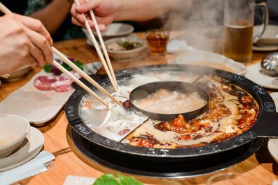 Hot pot chain responds after two men urinate in broth