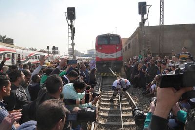 He can pull a train by the strength of his teeth. An Egyptian wrestler sets 3 world records