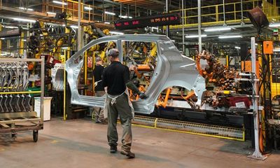 UK economy shrinks in January; stocks and euro jump on German debt deal – as it happened