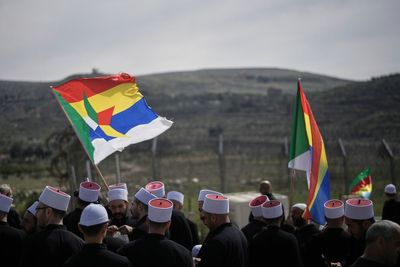 Dozens of Syrian Druze make a rare visit to Israeli-controlled Golan Heights