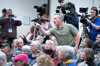 WATCH: Angry Constituents Hound North Carolina Lawmaker For Direct Responses to Trump Admin's Controversial Orders