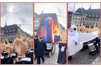 Switzerland's Anti-Trump Protestors Wear Giant Middle Fingers on Their Heads During March