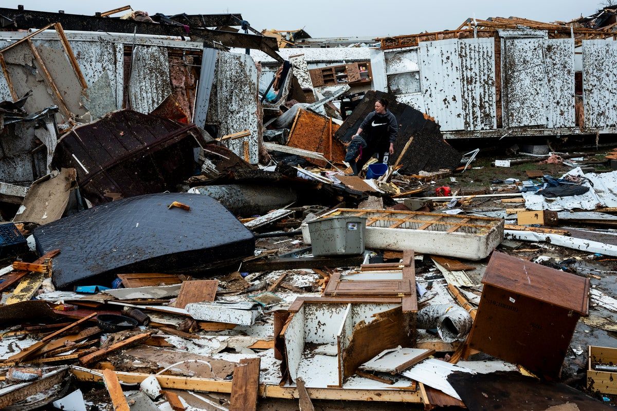 At least 32 dead as thousands left without power as…