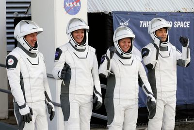 Nasa’s stranded astronauts welcome SpaceX crew to International Space Station