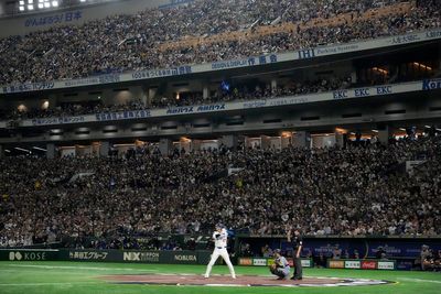 Shohei Ohtani merchandise is prompting long lines -- even in the rain -- in Tokyo