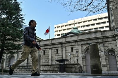 Bank Of Japan Holds Rates, Warning Of Trade Uncertainty