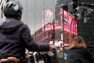 Stock market today: Asian shares are mixed after Wall Street falls back ahead of Fed rate decision