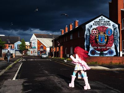 Flame-haired defiance by a Belfast mural: Hannah Starkey’s best photograph