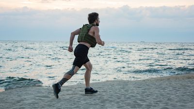 I’ve been walking with a weight vest for 5K every day to help boost my metabolism — here's what happened to my body