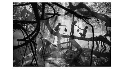 Beautiful black and white shot of boys fishing wins 9th Xposure International Photography Awards