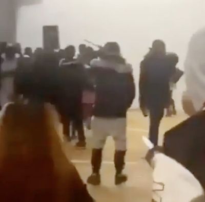 Two teenagers stabbed after dozens of youths storm school hall birthday party in east London