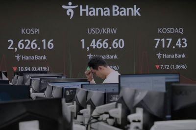 Stock market today: Asian shares are mostly lower after tech-fueled gain on Wall Street