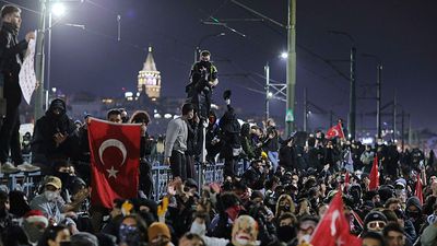 Turkey detains journalists as protests against jailing of Erdoğan rival rock nation