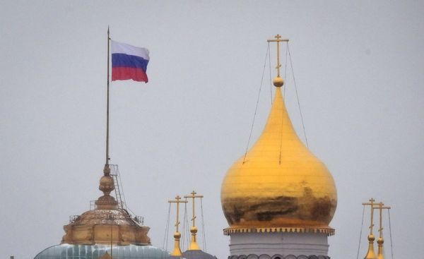 Russian priest arrested during Sunday service for 2014 photo with Ukrainian flag