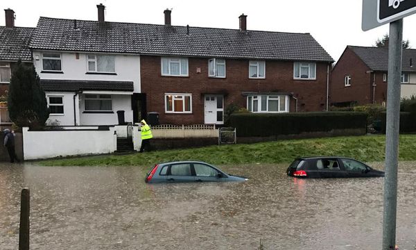 Storm Angus: floods hit south-west England – with more rain to come
