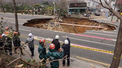 Motorcyclist found dead after falling into massive sinkhole in Seoul