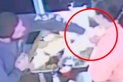 Couple caught on camera ‘putting hair in food to get a free meal’