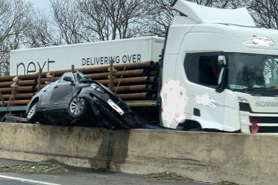 Car dragged 100 metres down central reservation but only minor injuries caused